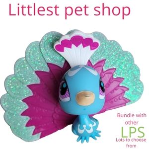 Hasbro Littlest Pet Shop fushia Blue peacock purple eyes collectible toy rare